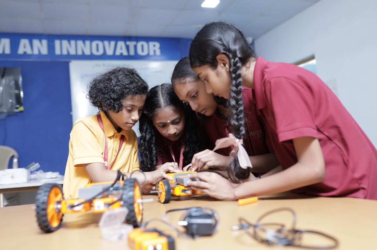 Indian school kids building robots in CreaSpark STEM lab